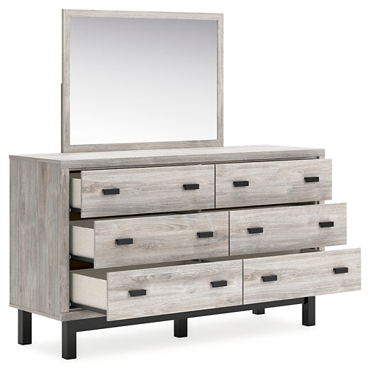 Vessalli King Panel Bed with Mirrored Dresser and Nightstand